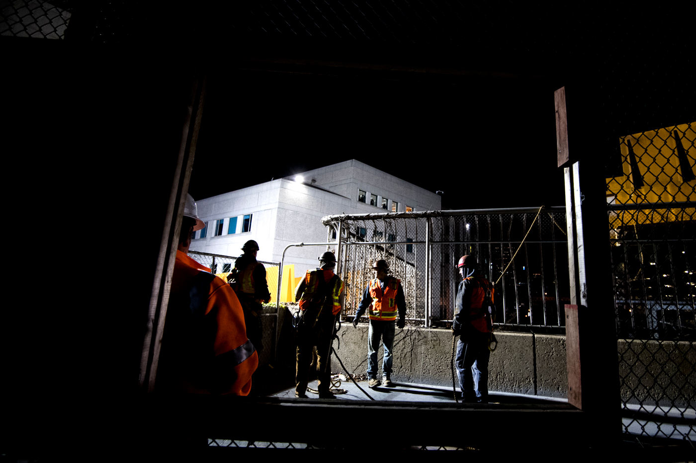 people watch ISEC Pedestrian Bridge installation