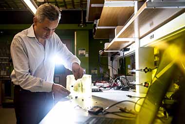 professor working in wireless lab