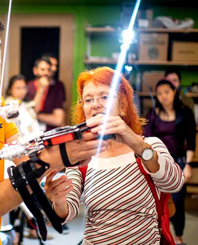 Dagmar Sternad investigating a robotic arm