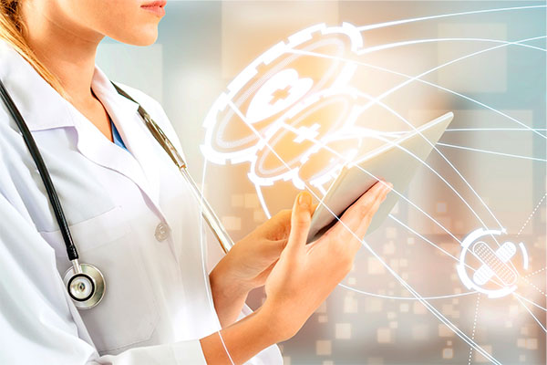 abstract photo of women doctor pointing to tablet with medical imagery around it
