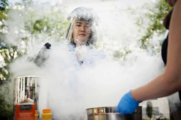 student working with liquid nitrogen