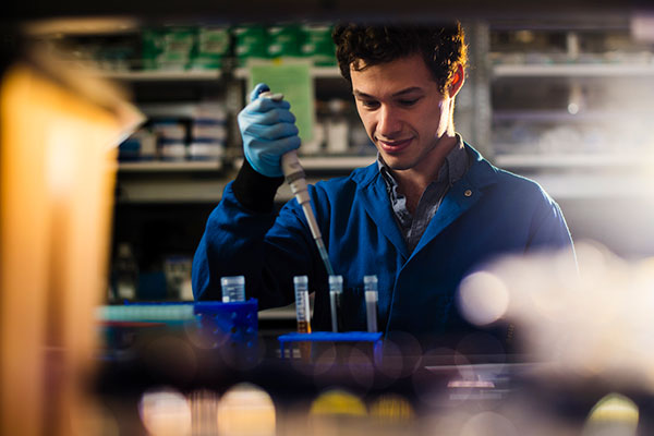 student working in chemical engineering lab