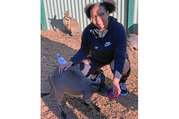 student in Australia with kangeroo