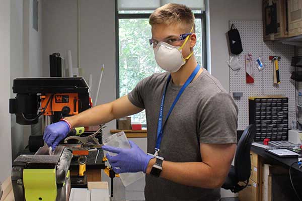 student working in chemical engineering lab