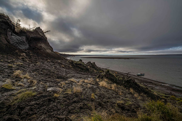 ocean with black carbon on shore