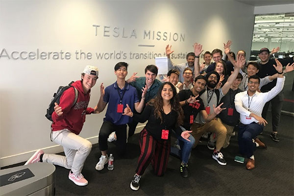 students inside tesla building