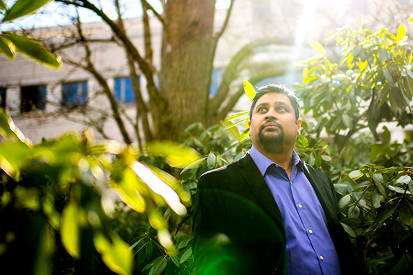 professor with rhododendron plants